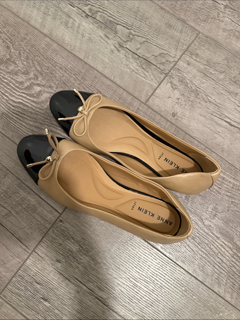 Anne Klein Tan and Black Cap-Toe Bow Ballet Flats